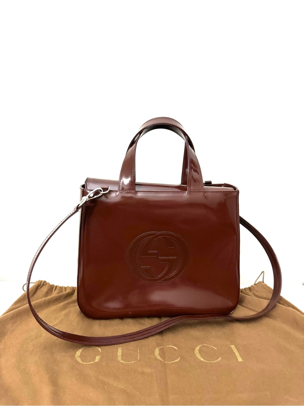 Authentic Gucci Glossy Brown Patent Leather Satchel with Double G Emboss